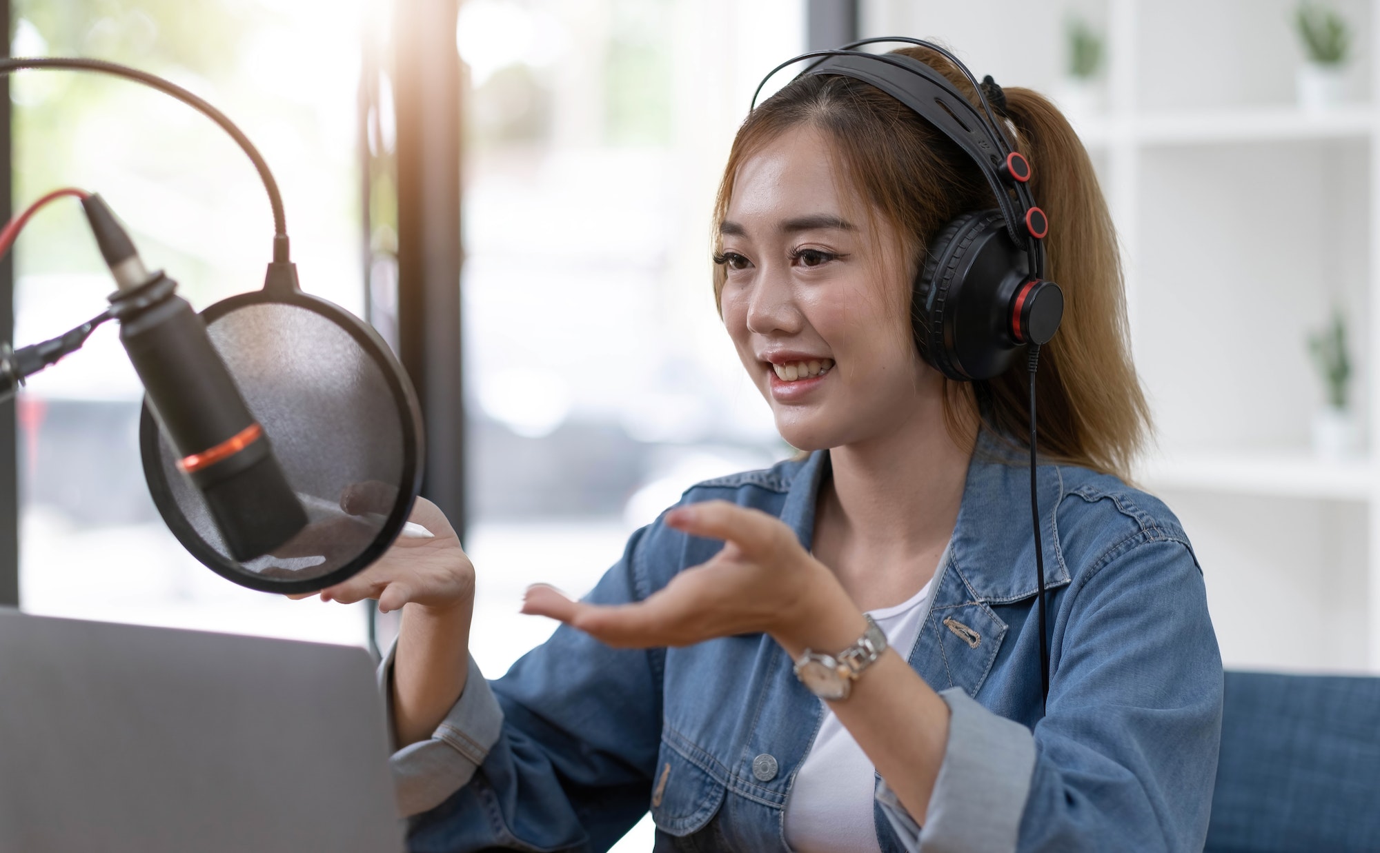 beautiful-asian-young-woman-radio-host-working-setting-microphone-preparing-to-speak-before.jpg