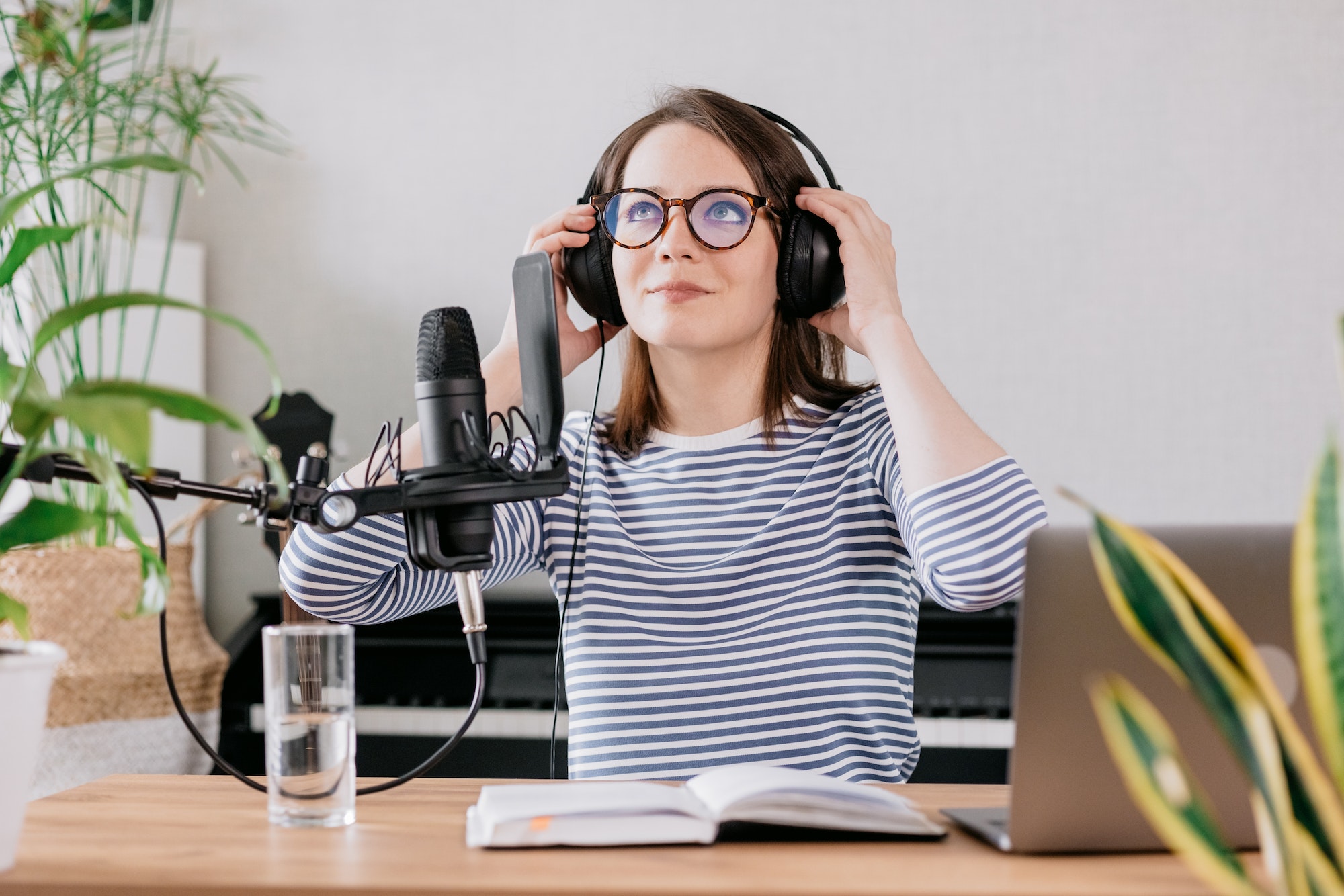 caucasian-woman-preparing-to-record-a-podcast-or-radio-recording-her-voice-for-an-audiobook.jpg